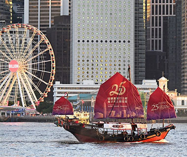 DUKLING, the only traditional Chinese sailing junk boat in Hong Kong, plied across the Victoria Harbour decked out in sails celebrating the 25th anniversary of the HKSAR.