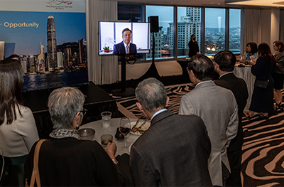 The Secretary for Commerce and Economic Development, Mr Algernon Yau, delivers a pre-recorded keynote speech at a reception celebrating the 25th anniversary of the establishment of HKSAR in Seattle, Washington, on September 15.