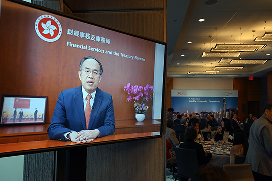 The Secretary for Financial Services and the Treasury, Mr Christopher Hui, delivers a video keynote address at a business luncheon celebrating the 25th anniversary of the establishment of the Hong Kong Special Administrative Region in Los Angeles on October 26.