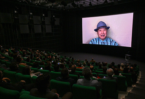 Sammo Hung delivering a pre-recorded speech at the opening screenings of “The Millionaires' Express” with “Pedicab Driver” on May 5.