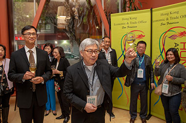 The Director of the Hong Kong Economic and Trade Office, San Francisco, Mr Ivanhoe Chang, attended a reception prior to the screening of "Still Human" at CAAMFest 37 in San Francisco on May 15.  Photo shows Executive Director of the Center for Asian American Media, Mr Stephen Gong (centre) and Mr Chang (left) propose a toast at the reception.