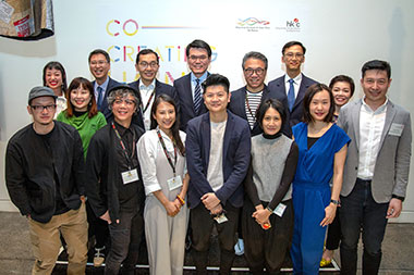 Hong Kong Secretary for Commerce and Economic Development, Mr Edward Yau (Centre, back row) with participating designers at Co-Creating Hong Kong: a design+ exhibition opening ceremony.